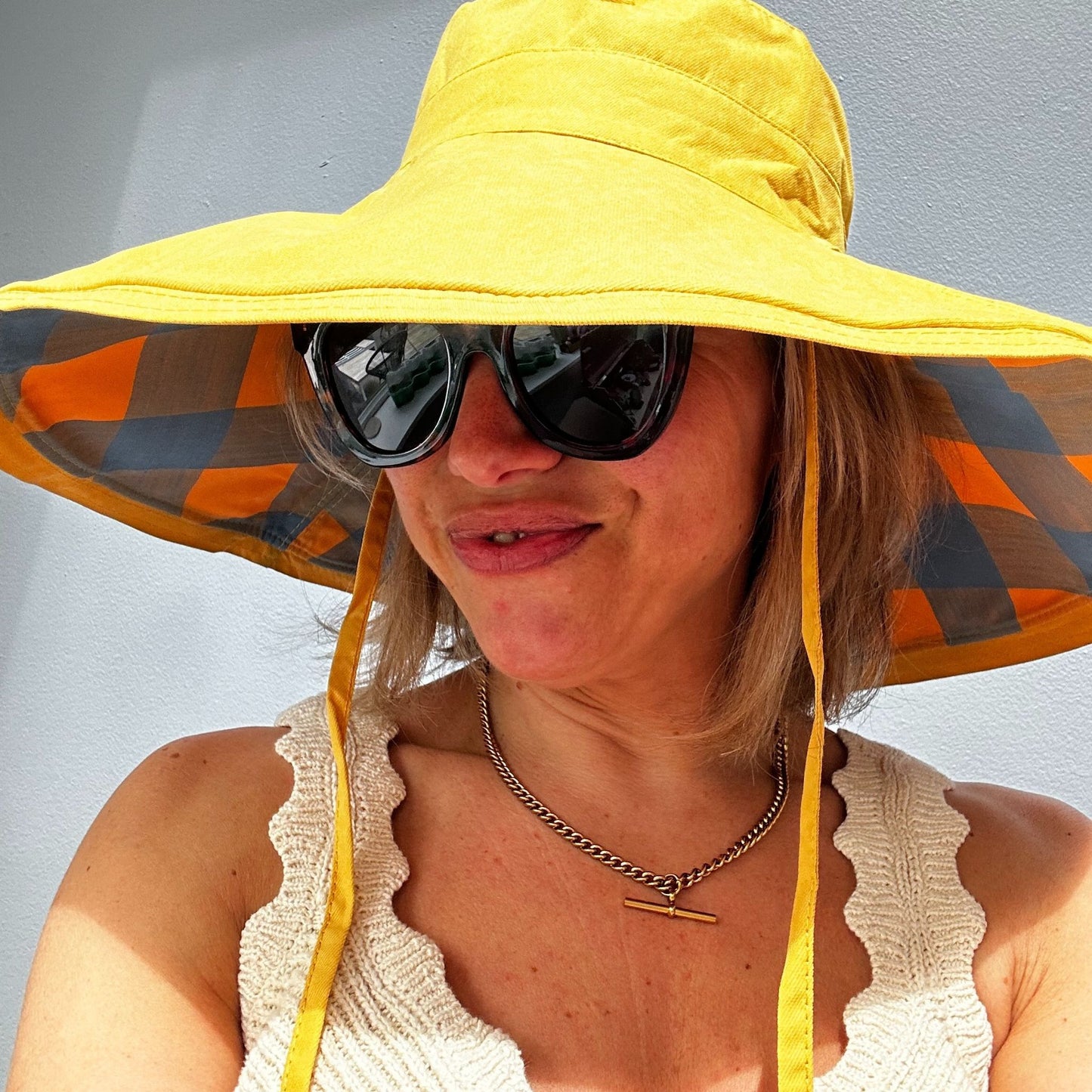 Wide brimmed reversible checked sunhats