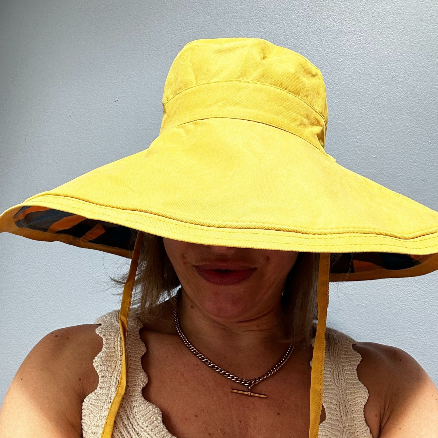 Wide brimmed reversible checked sunhats