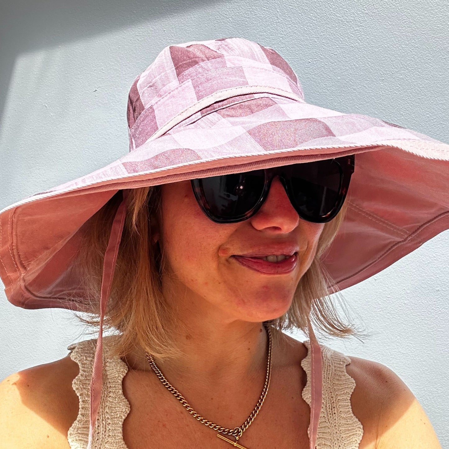 Wide brimmed reversible checked sunhats