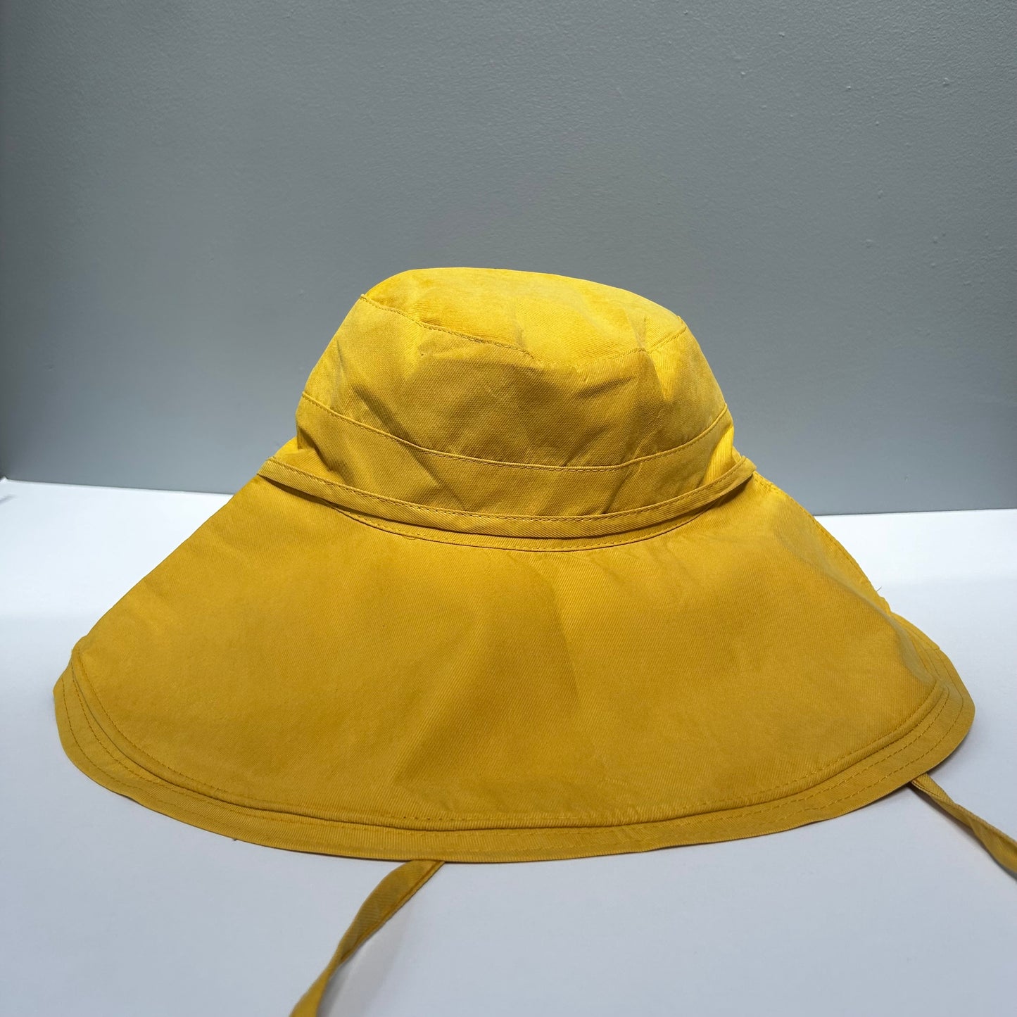 Wide brimmed reversible checked sunhats