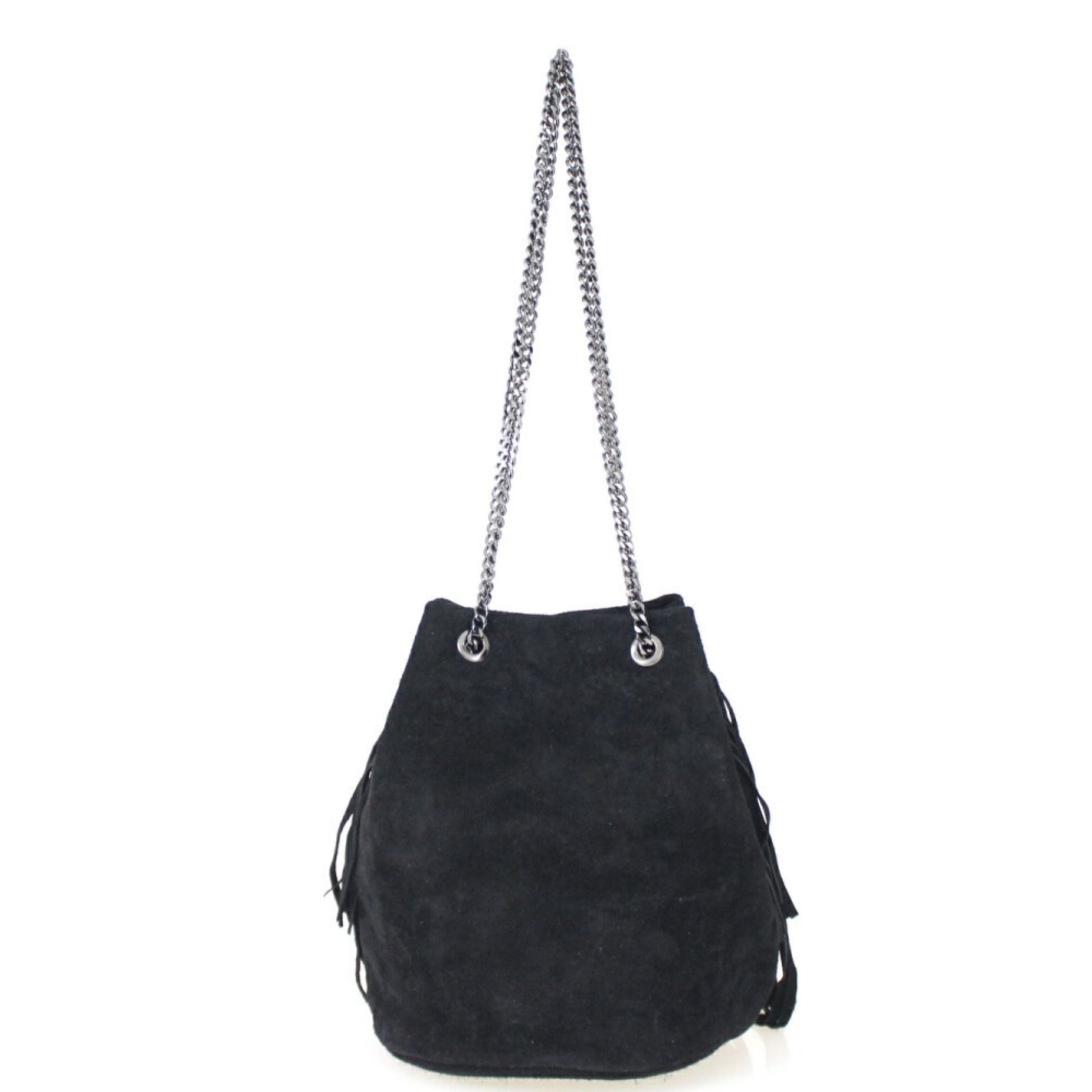 A black fringed suede bag with a silver chain strap hanging against a white background.