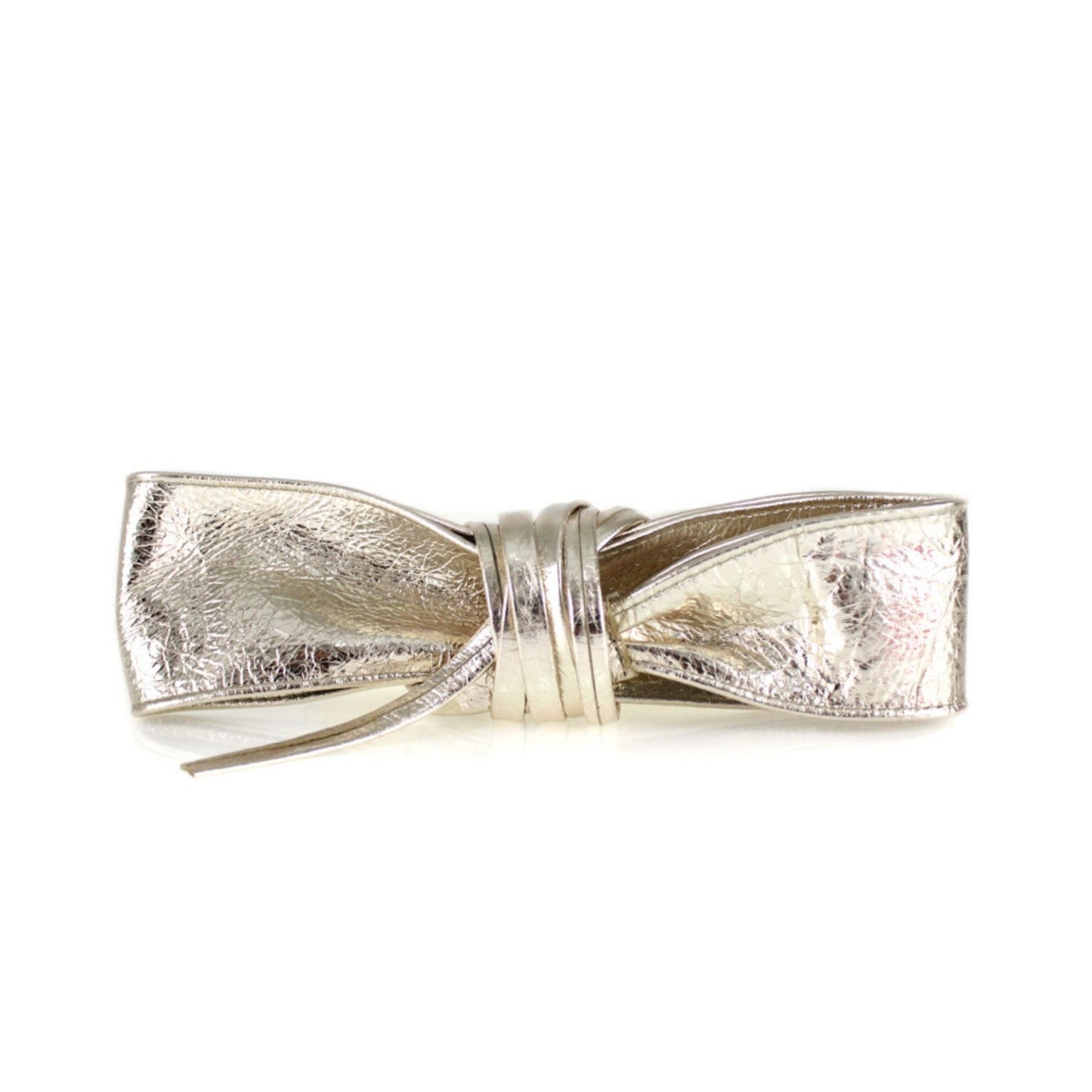 Close-up view of a gold Obi Leather Wrap Belt tied in a stylish knot.