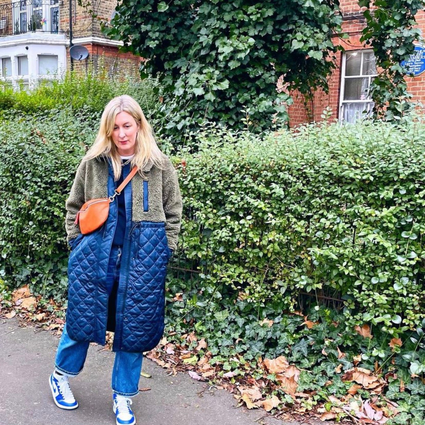 Orange bumbag on lady in street