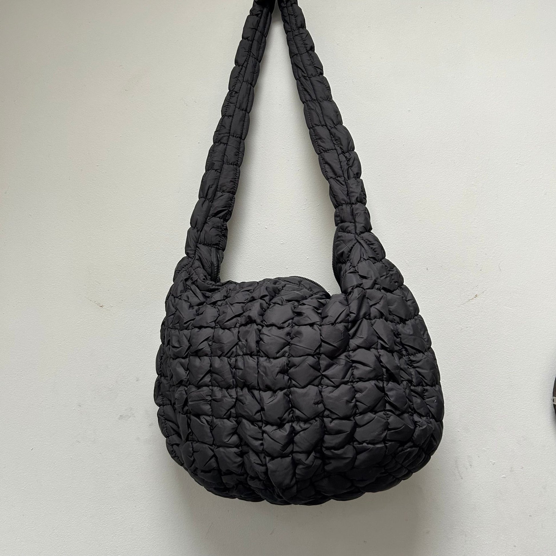Oversized Quilted Cross-Body bag in textured black, perfect for any occasion.