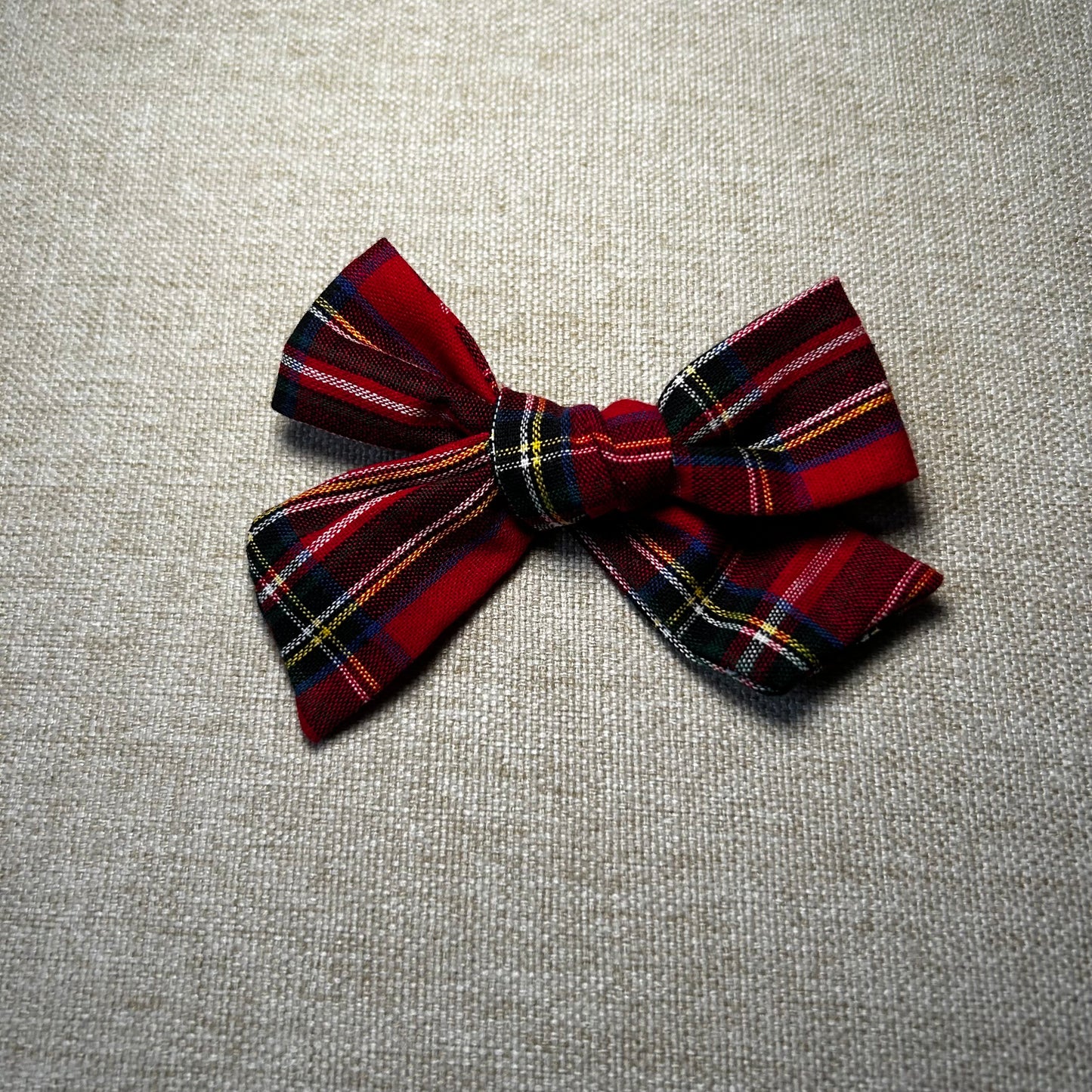 Tartan bow brooches