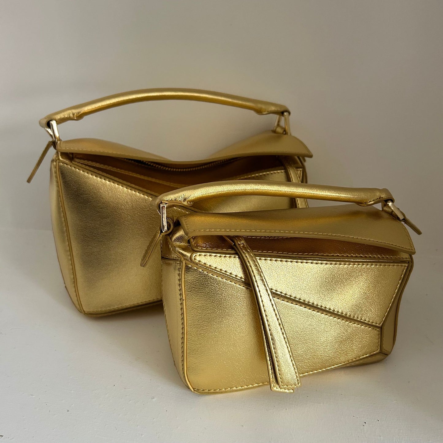 Gold Leather Grab Handle Geometric Bags
