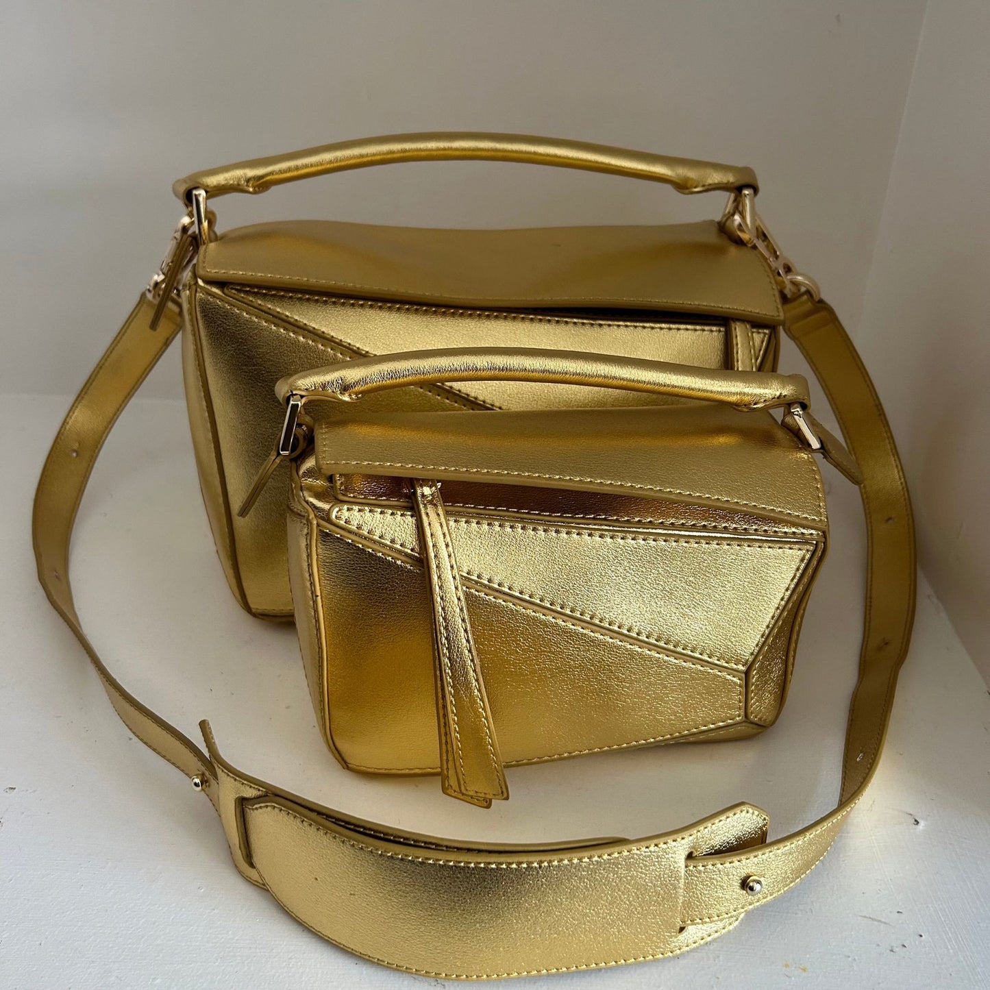Gold Leather Grab Handle Geometric Bags