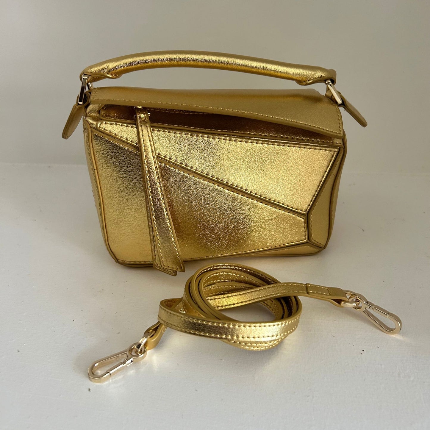 Gold Leather Grab Handle Geometric Bags