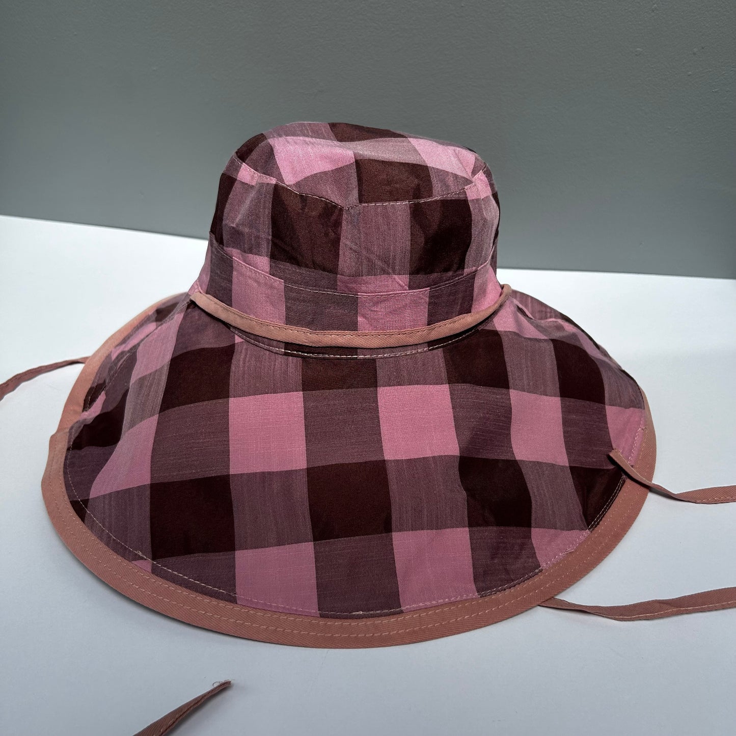 Wide brimmed reversible checked hats