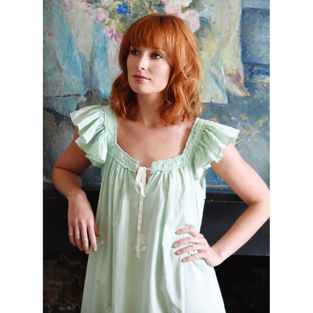 Model wearing the Green Vintage Style Sundress/Nightdress standing against a wall.