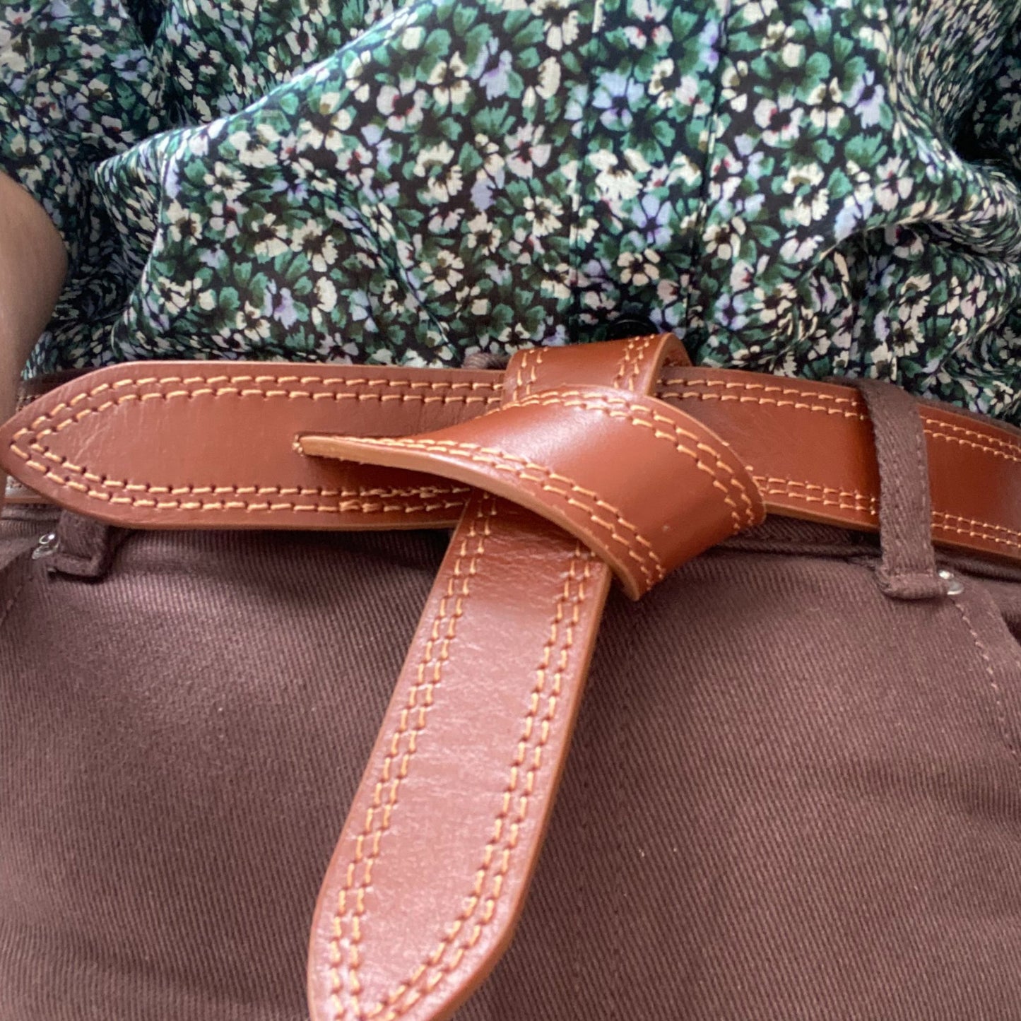 close up of leather knot belt