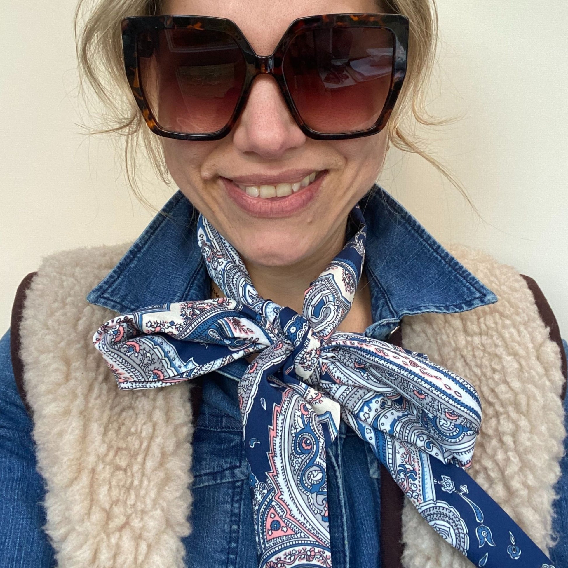 lady wearing paisley scarf and sunglasses